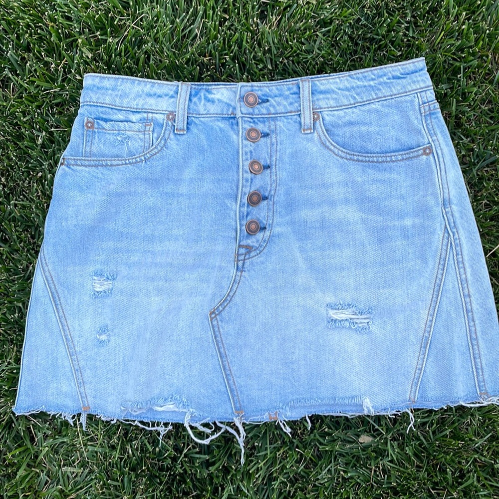 We The Free denim mini skirt size 30, 14 1/2” in length.